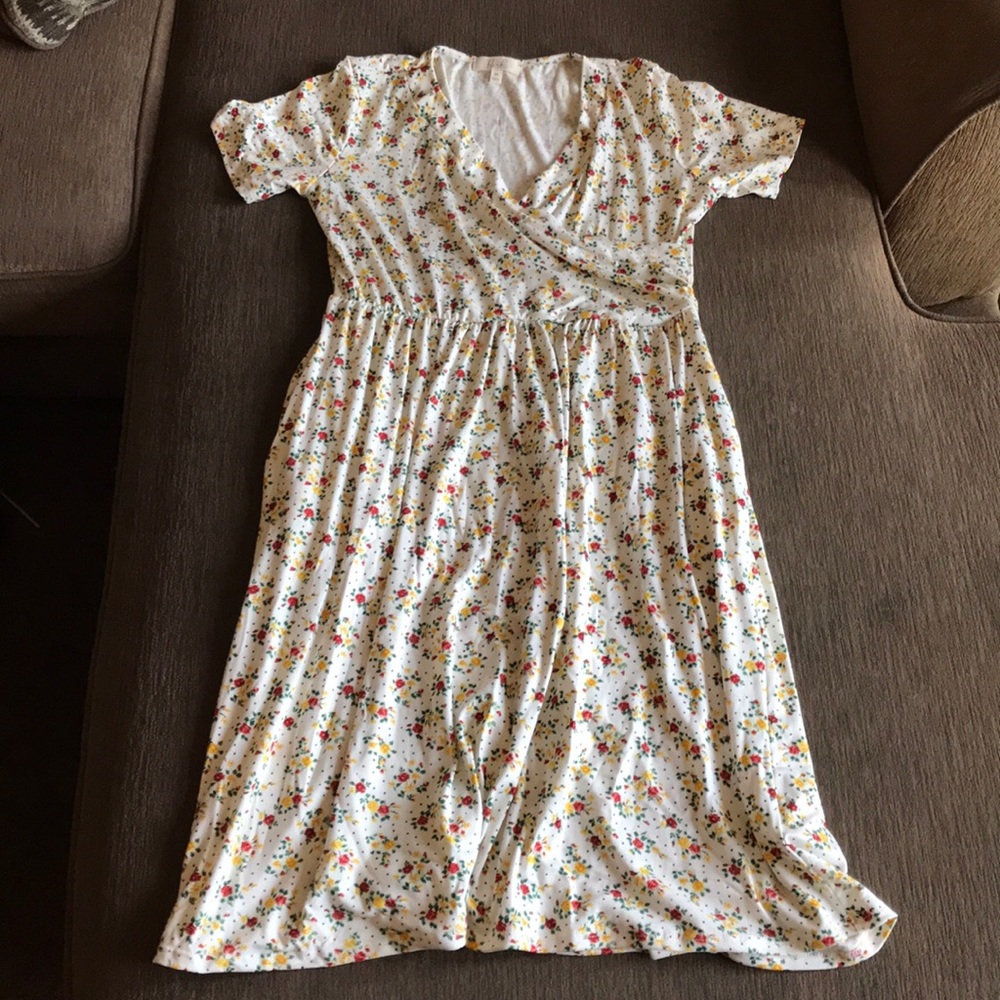 Dress never worn with pockets !